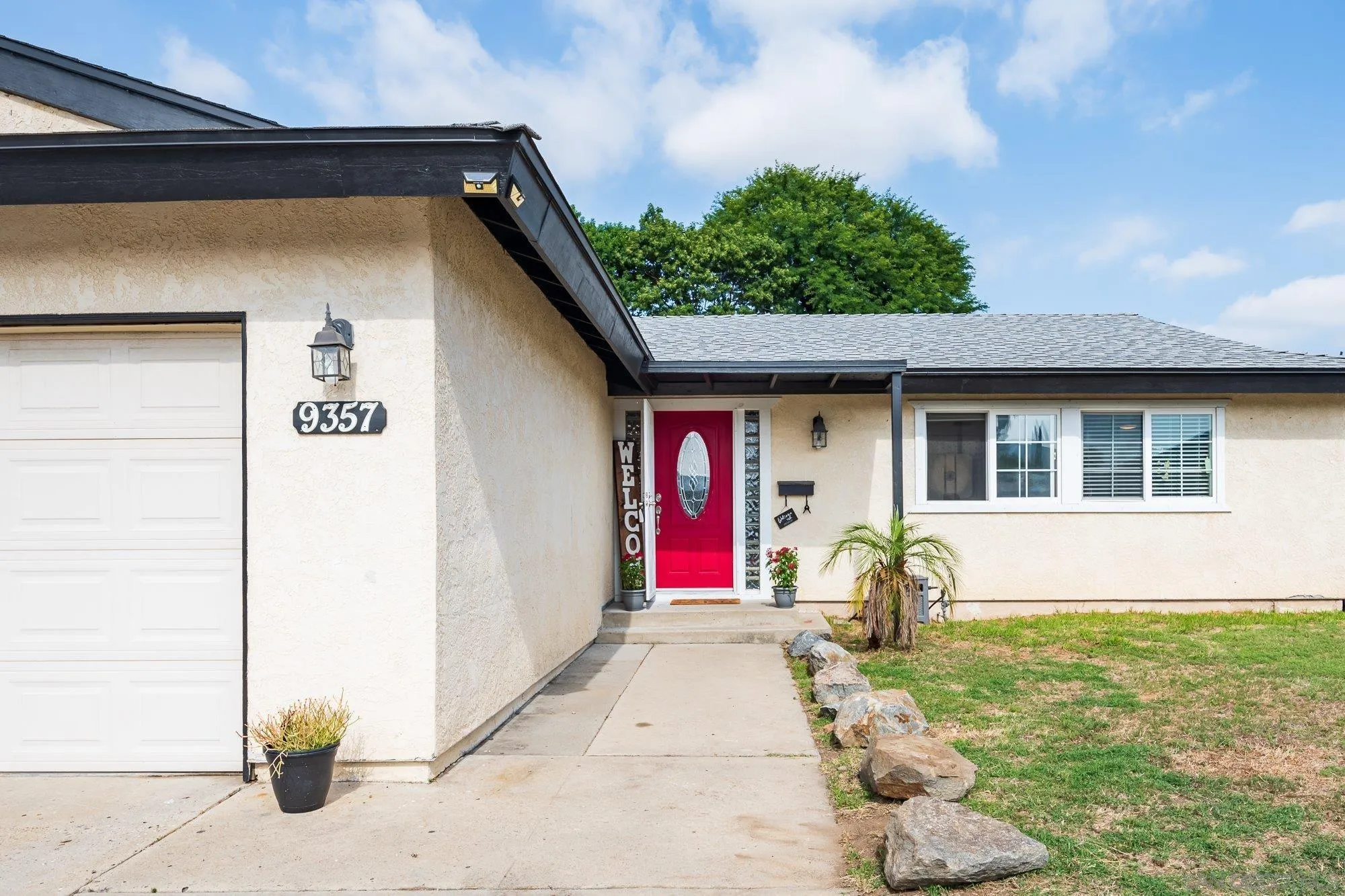 9357 Dempster Drive Santee, CA 92071 - Photo 6 of 35 a front view of a house with patio