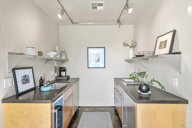 a view of a swimming pool with furniture