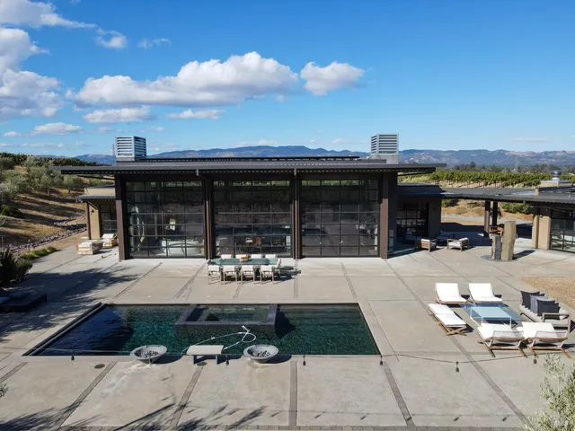 a very nice looking living room with a large window