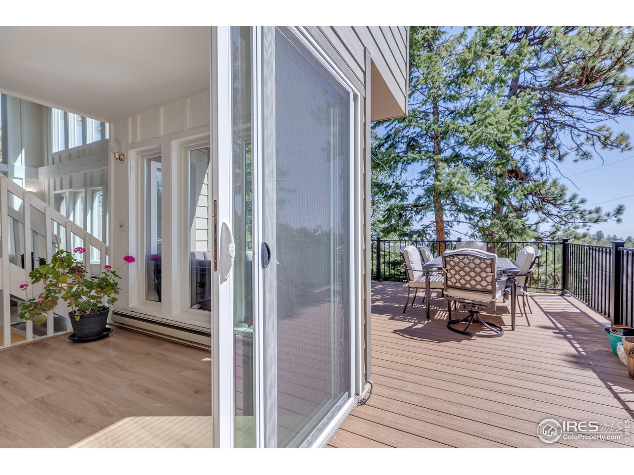 287 Brook Circle Boulder, CO 80302 - Photo 11 of 36 a balcony with furniture and a potted plant