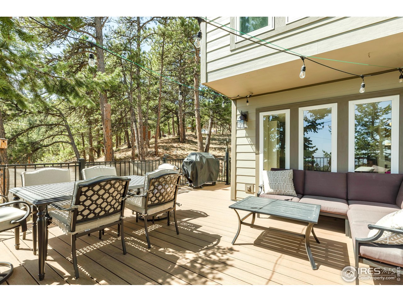 287 Brook Circle Boulder, CO 80302 - Photo 13 of 36 a outdoor living space with furniture and a potted plant