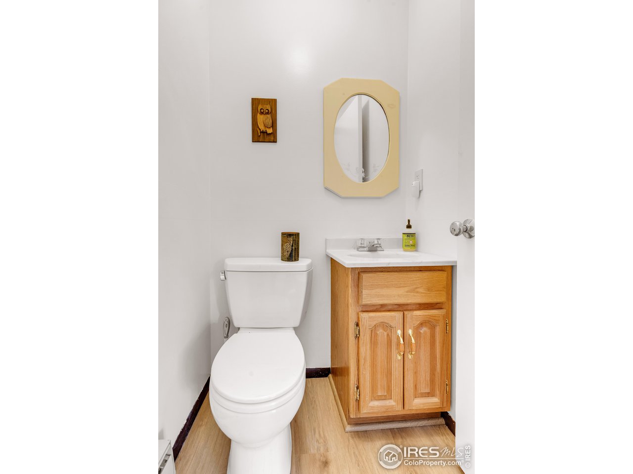 287 Brook Circle Boulder, CO 80302 - Photo 15 of 36 a bathroom with a toilet sink and mirror