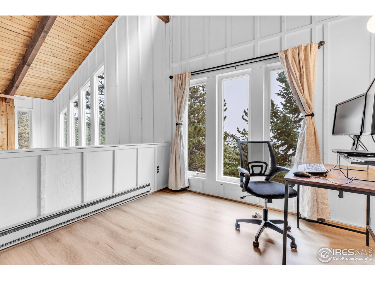 287 Brook Circle Boulder, CO 80302 - Photo 17 of 36 a view of a workspace with furniture and a window