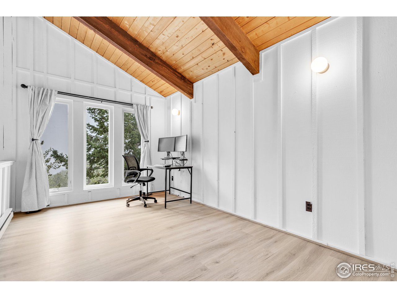 287 Brook Circle Boulder, CO 80302 - Photo 19 of 36 a view of a livingroom with furniture and hardwood floor