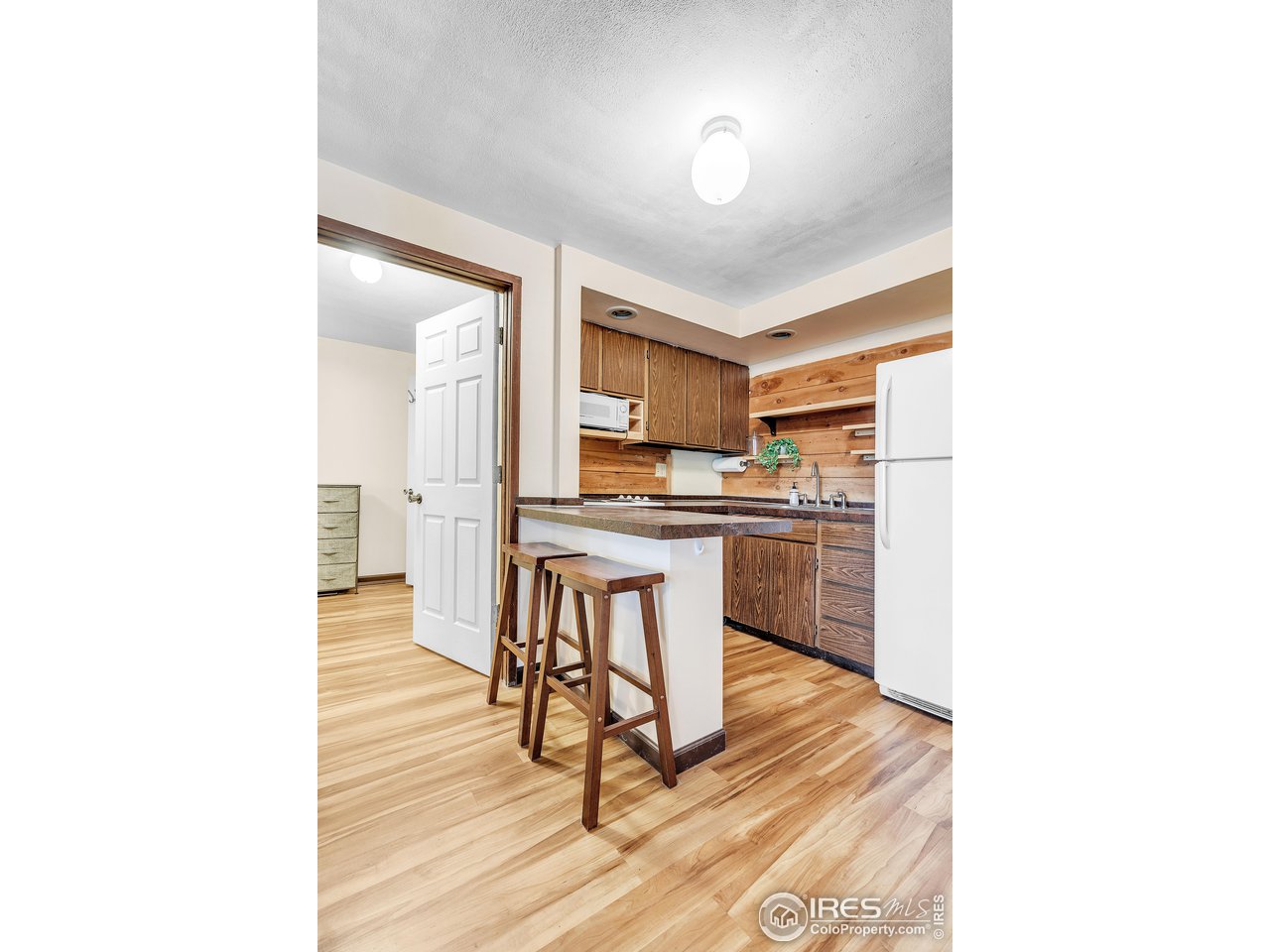 287 Brook Circle Boulder, CO 80302 - Photo 28 of 36 a kitchen with a sink cabinets and stainless steel appliances