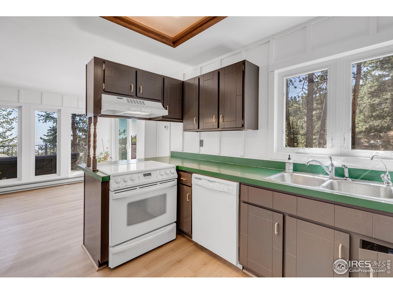 287 Brook Circle Boulder, CO 80302 - Photo 5 of 36 a kitchen with a sink cabinets and window