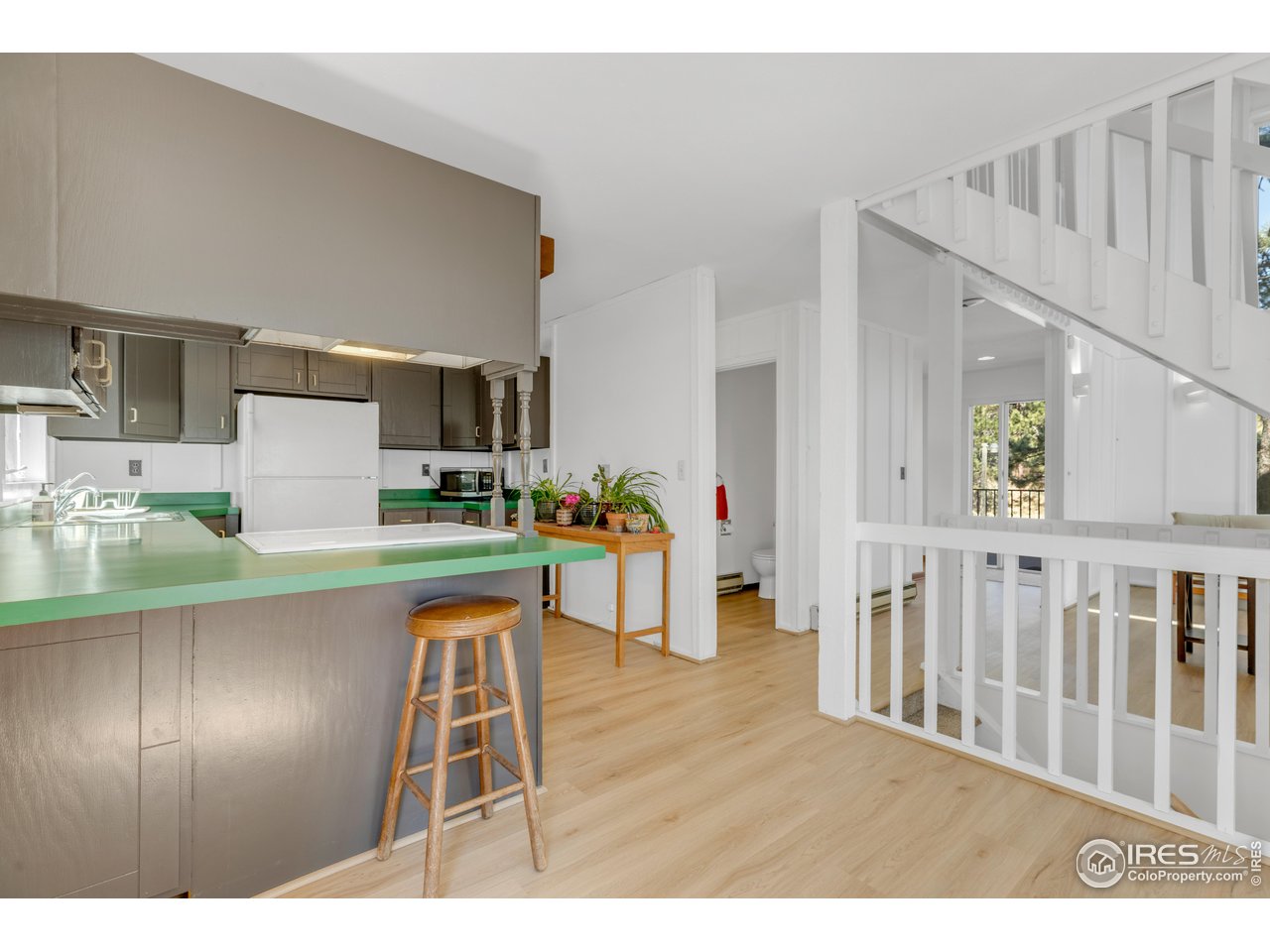287 Brook Circle Boulder, CO 80302 - Photo 7 of 36 a open kitchen with stainless steel appliances granite countertop a refrigerator and a sink