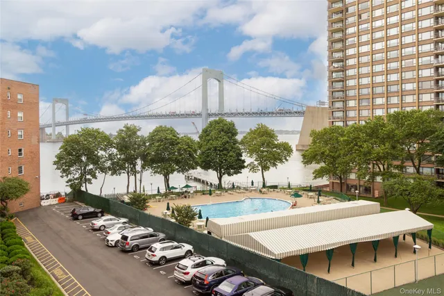 a view of a swimming pool with a patio