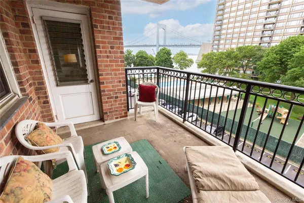 a balcony with an outdoor space