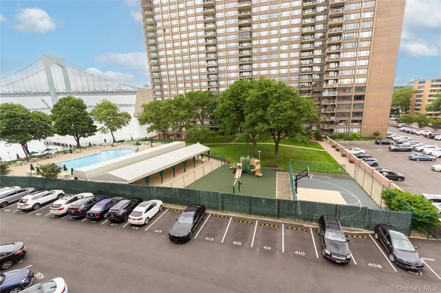 a view of a patio with a table and chairs