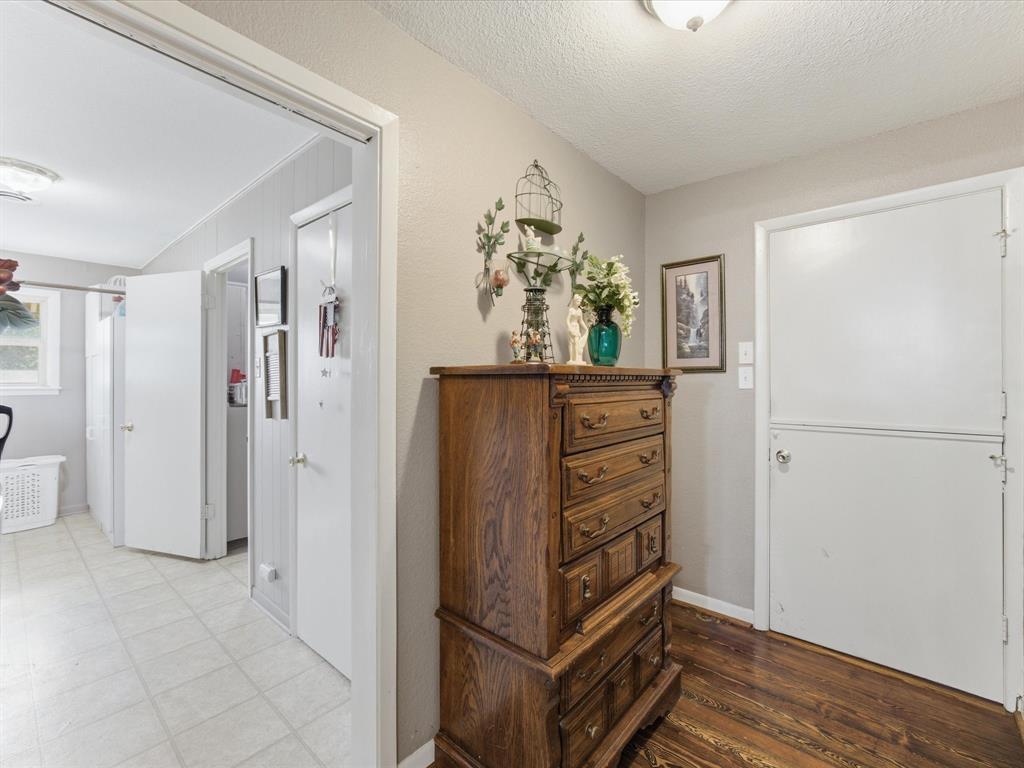 301 Ovilla Road Waxahachie, TX 75167 - Photo 29 of 38 wooden view of walk in closet with window