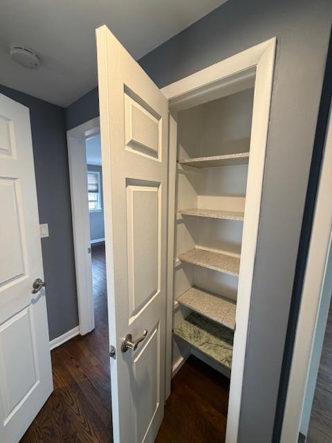 531 Walnut Street, Unit 2 Ridgefield, NJ 07657 - Photo 7 of 9 a view of walk in closet with empty racks