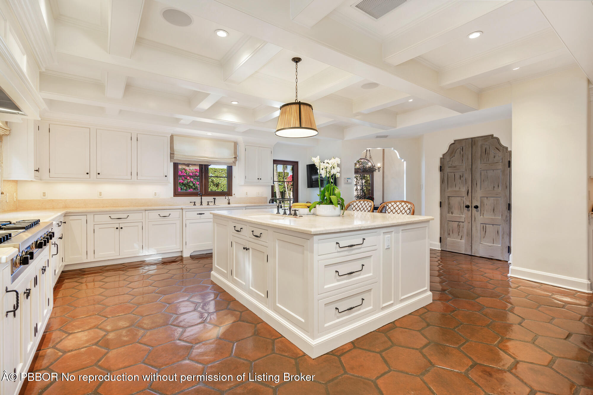 237 El Bravo Way Palm Beach, FL 33480 - Photo 15 of 41 a spacious bathroom with a double vanity sink a mirror a bathtub and a shower