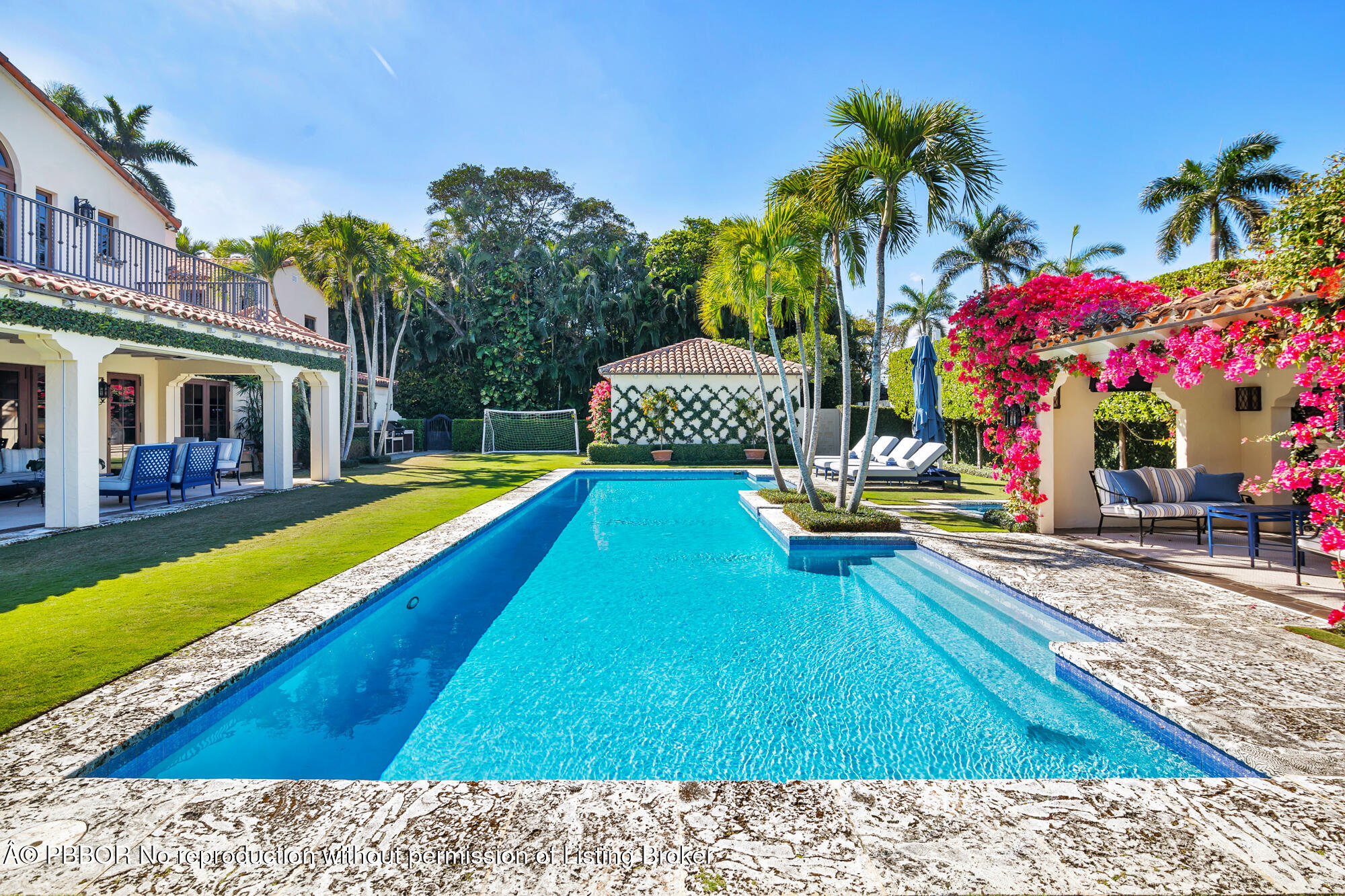 237 El Bravo Way Palm Beach, FL 33480 - Photo 23 of 41 a swimming pool with outdoor seating and yard