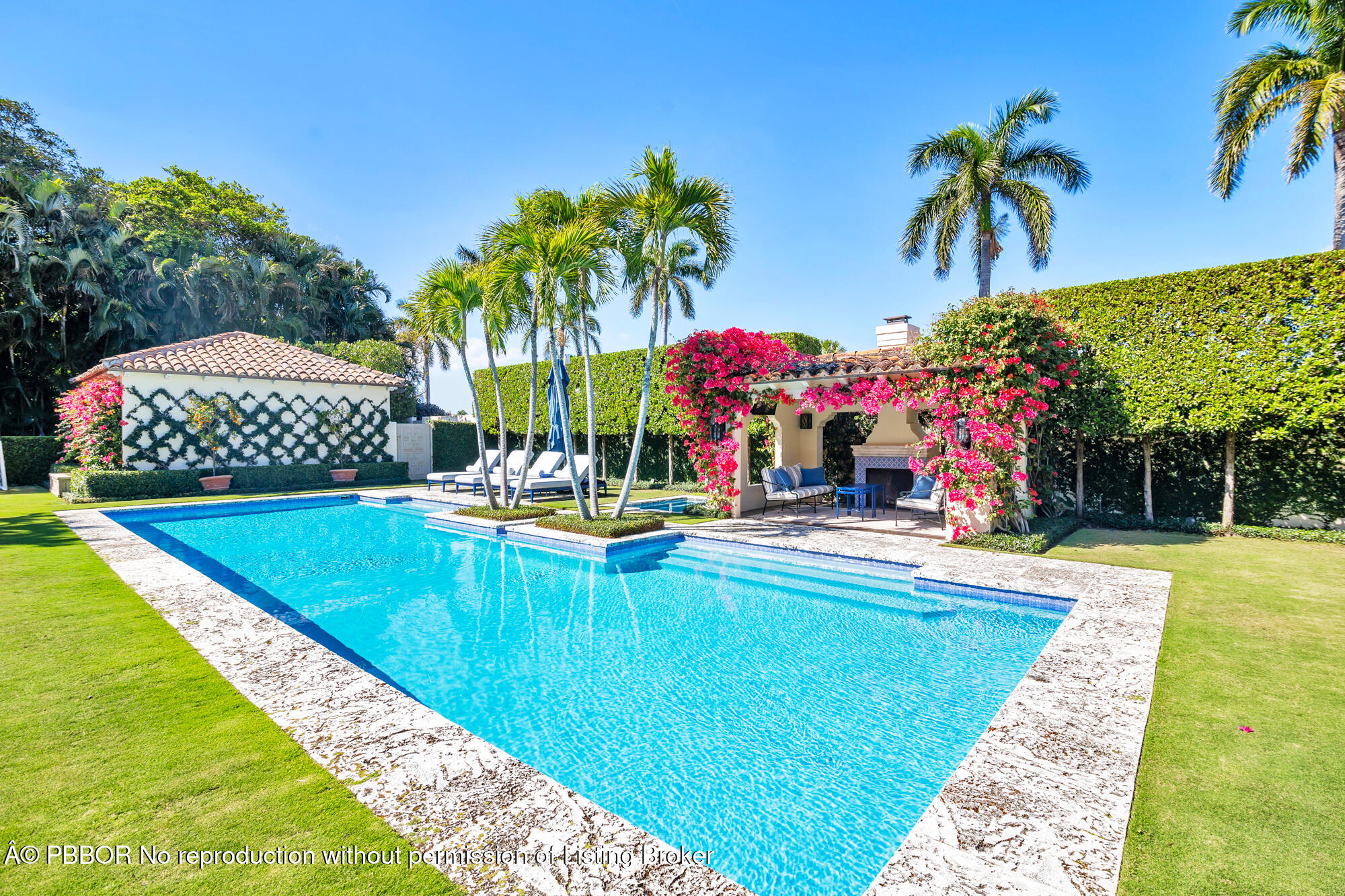 237 El Bravo Way Palm Beach, FL 33480 - Photo 26 of 41 a view of swimming pool with sitting area