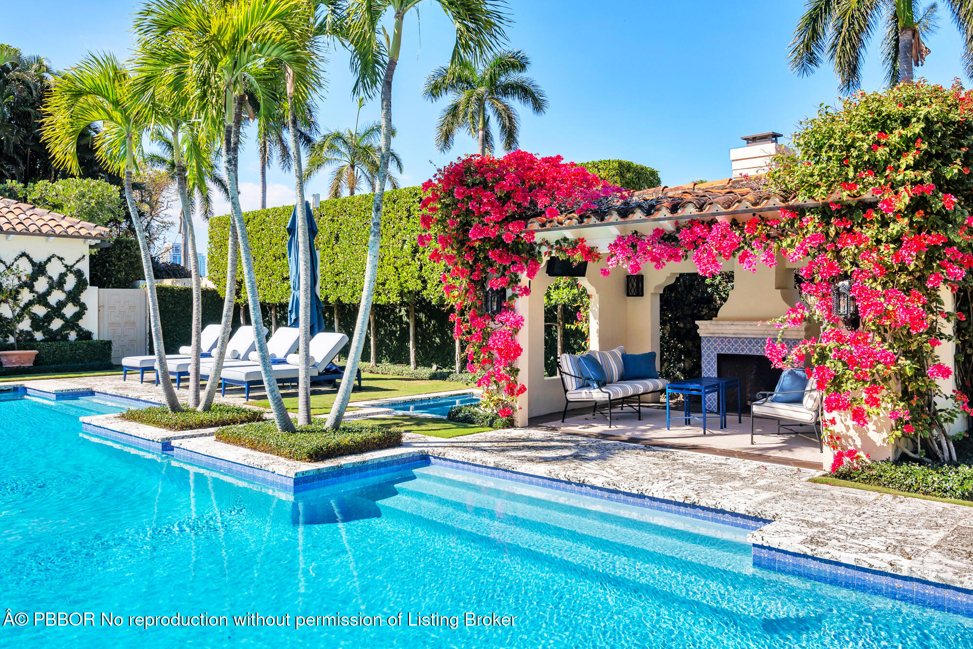 237 El Bravo Way Palm Beach, FL 33480 - Photo 27 of 41 a view of swimming pool with a sitting area