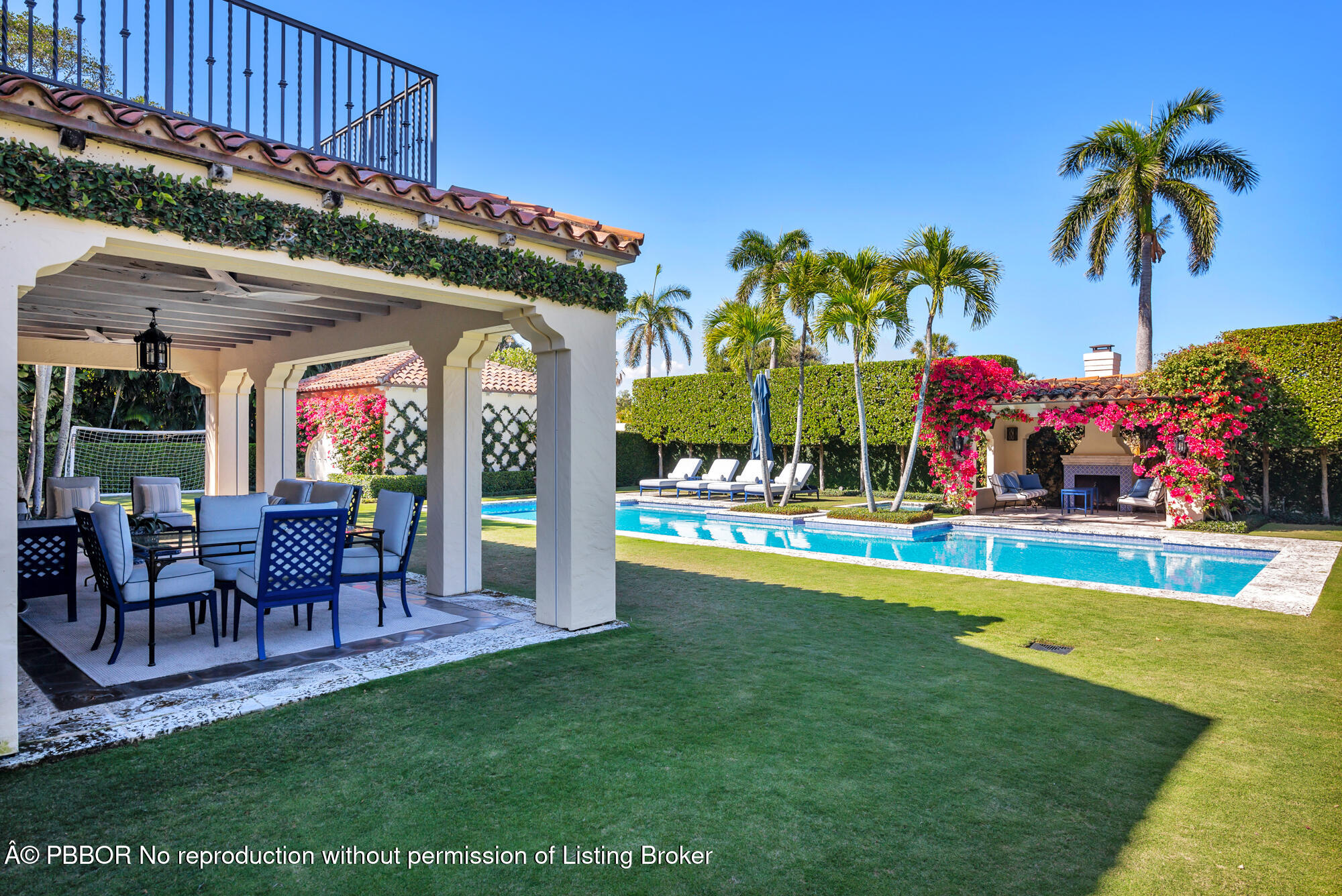 237 El Bravo Way Palm Beach, FL 33480 - Photo 30 of 41 a view of an chairs and table in the patio