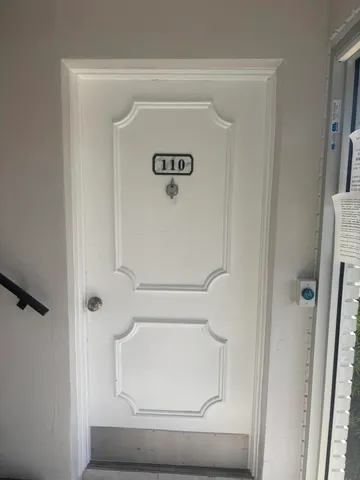 a bathroom with a shower and a toilet