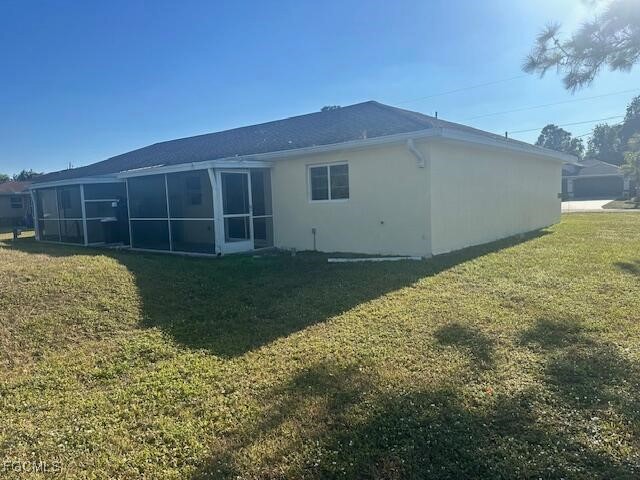 5220-5222 27th Street Southwest Lehigh Acres, FL 33973 - Photo 2 of 9 a view of a backyard