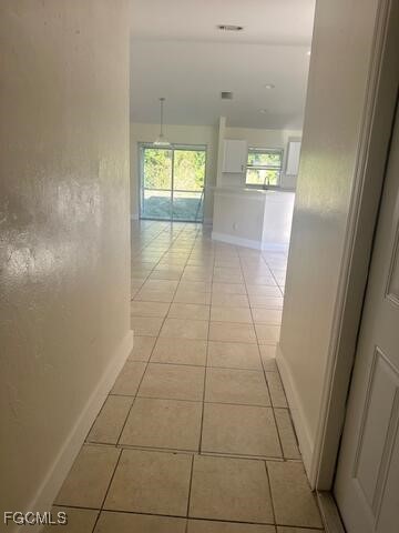 5220-5222 27th Street Southwest Lehigh Acres, FL 33973 - Photo 3 of 9 a view of an empty room and a window