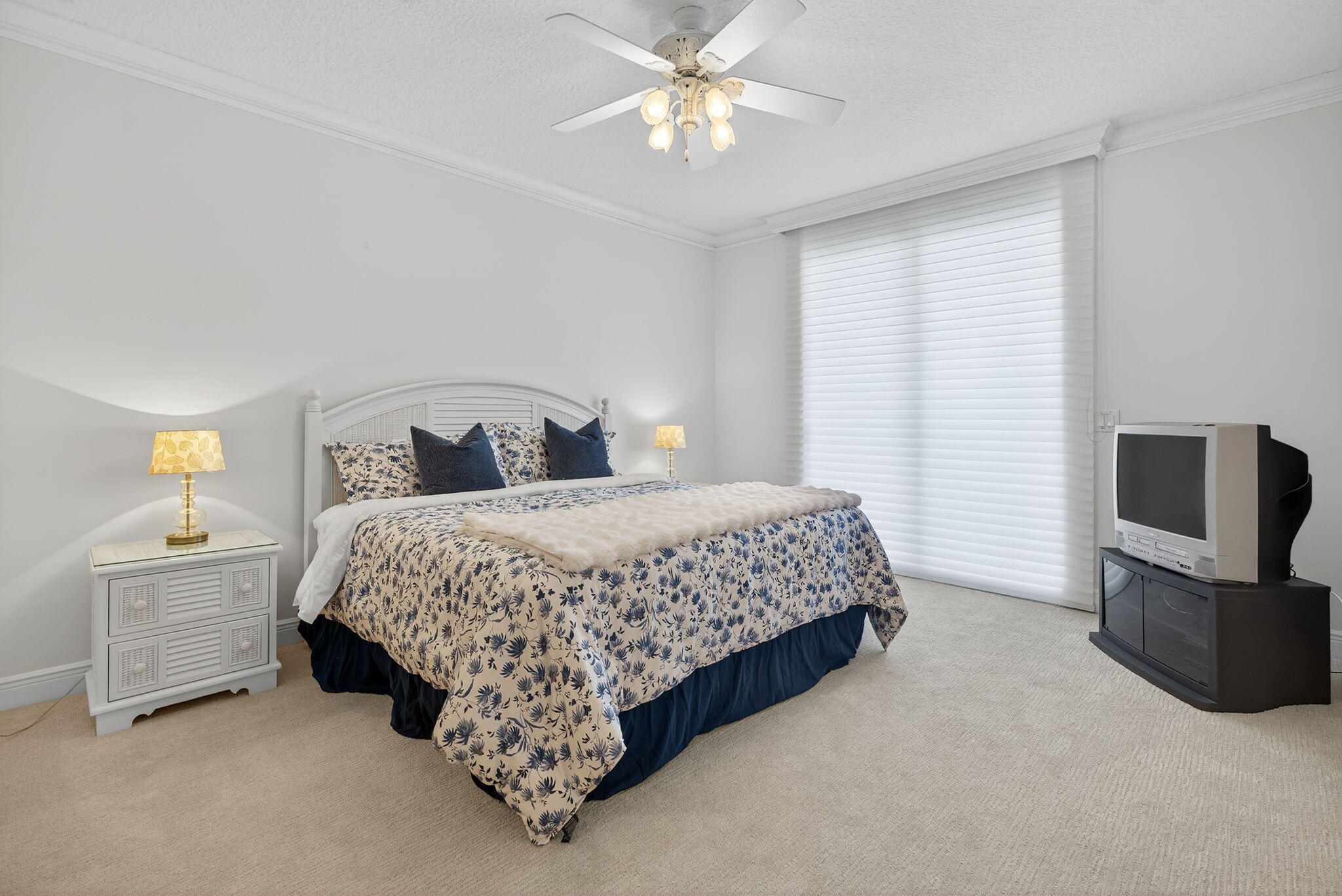 700 Ocean Royale, Unit PH 3 Juno Beach, FL 33408 - Photo 33 of 38 a bedroom with a bed and a television