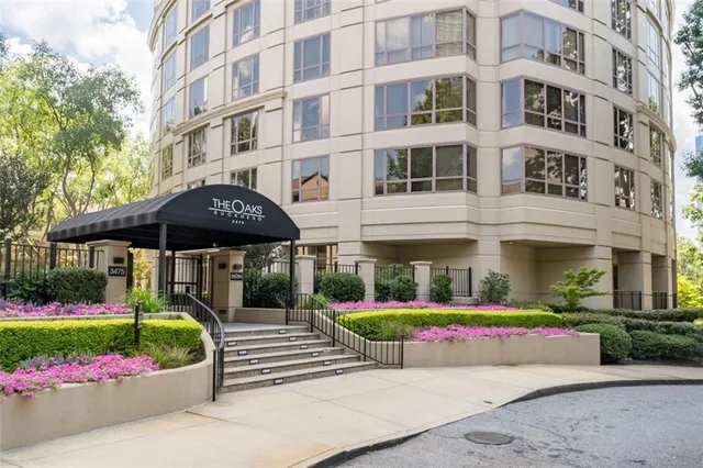 a front view of a building with garden