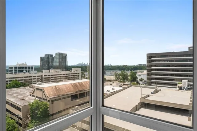 a view of a balcony with a patio