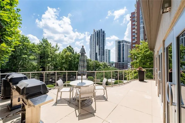 a view of a terrace with furniture