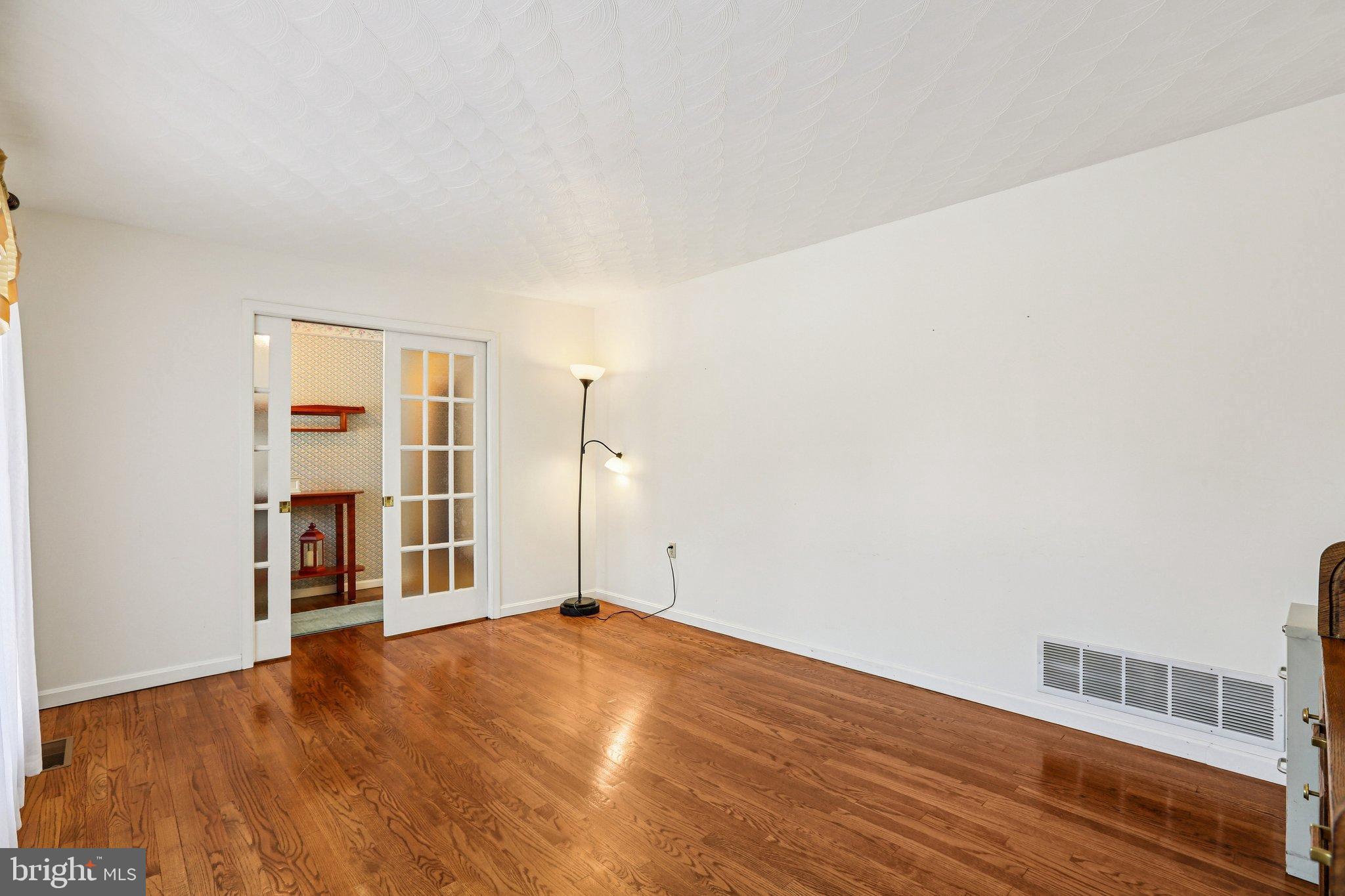 412 Marsteller Road New Park, PA 17352 - Photo 14 of 47 Bright and airy space with hardwood floors.