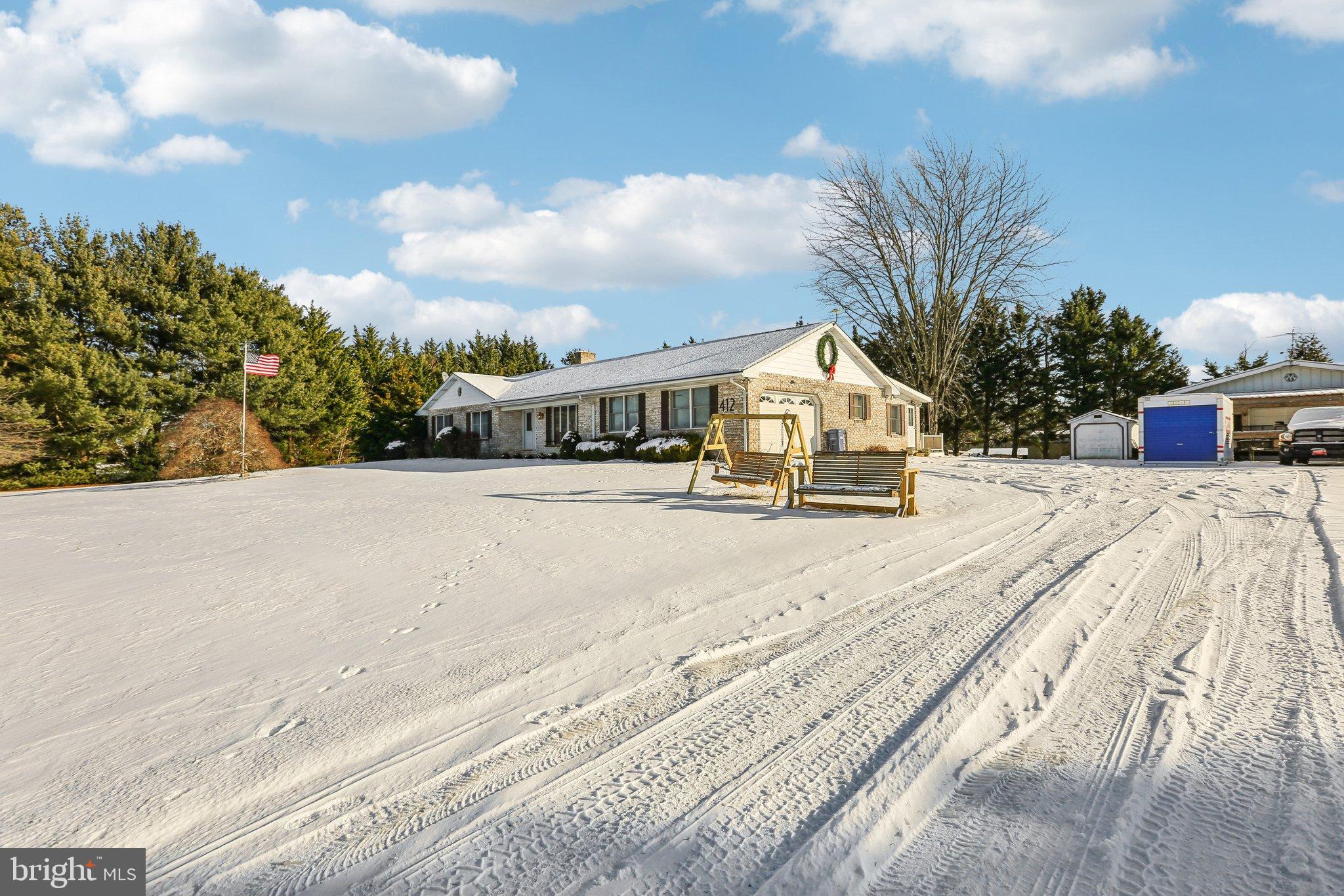 412 Marsteller Road New Park, PA 17352 - Photo 5 of 47 Charming home nestled in a snowy landscape.