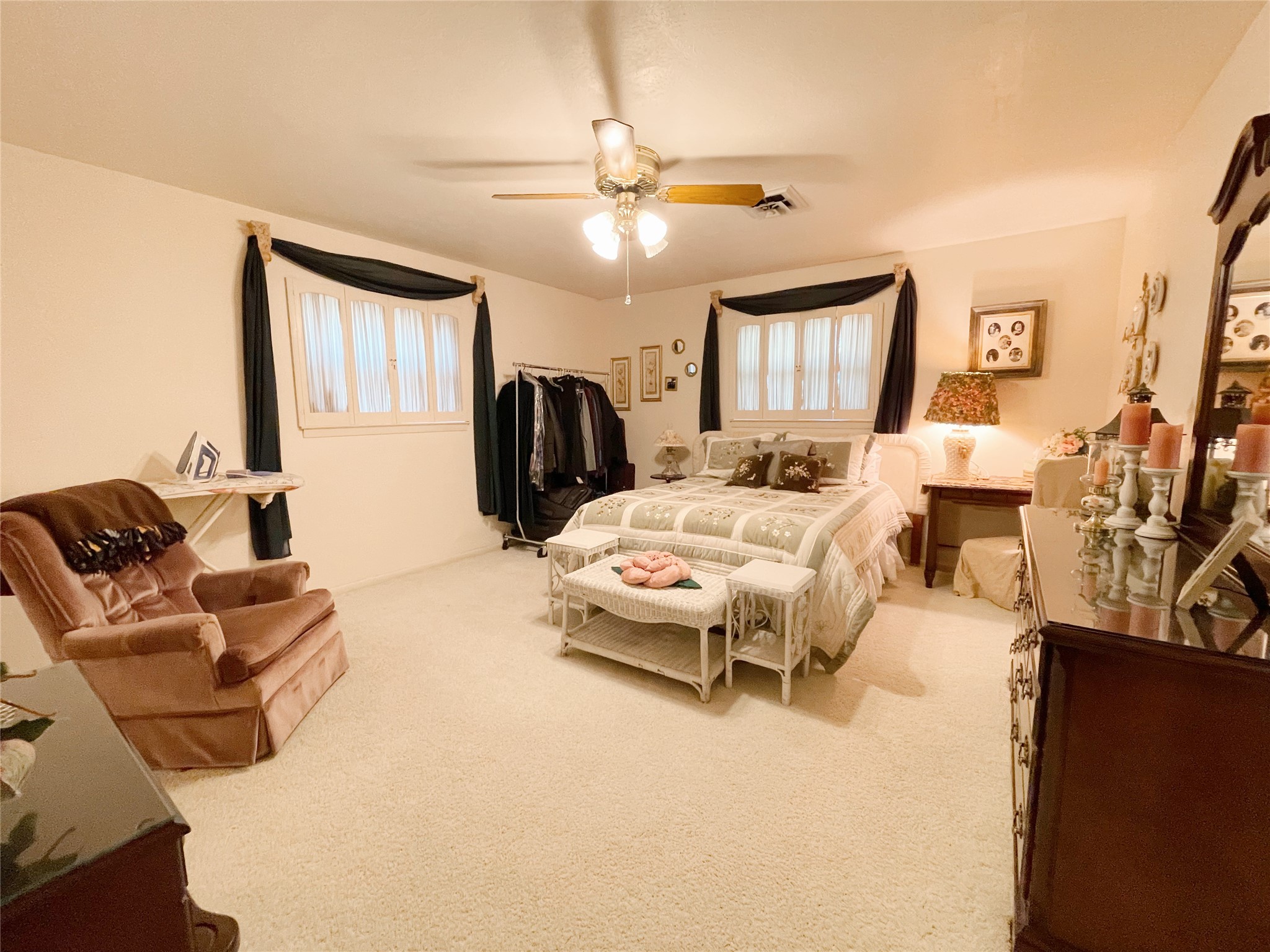 700 Shanklin Road Belton, TX 76513 - Photo 25 of 33 a bedroom with a bed and wooden floor