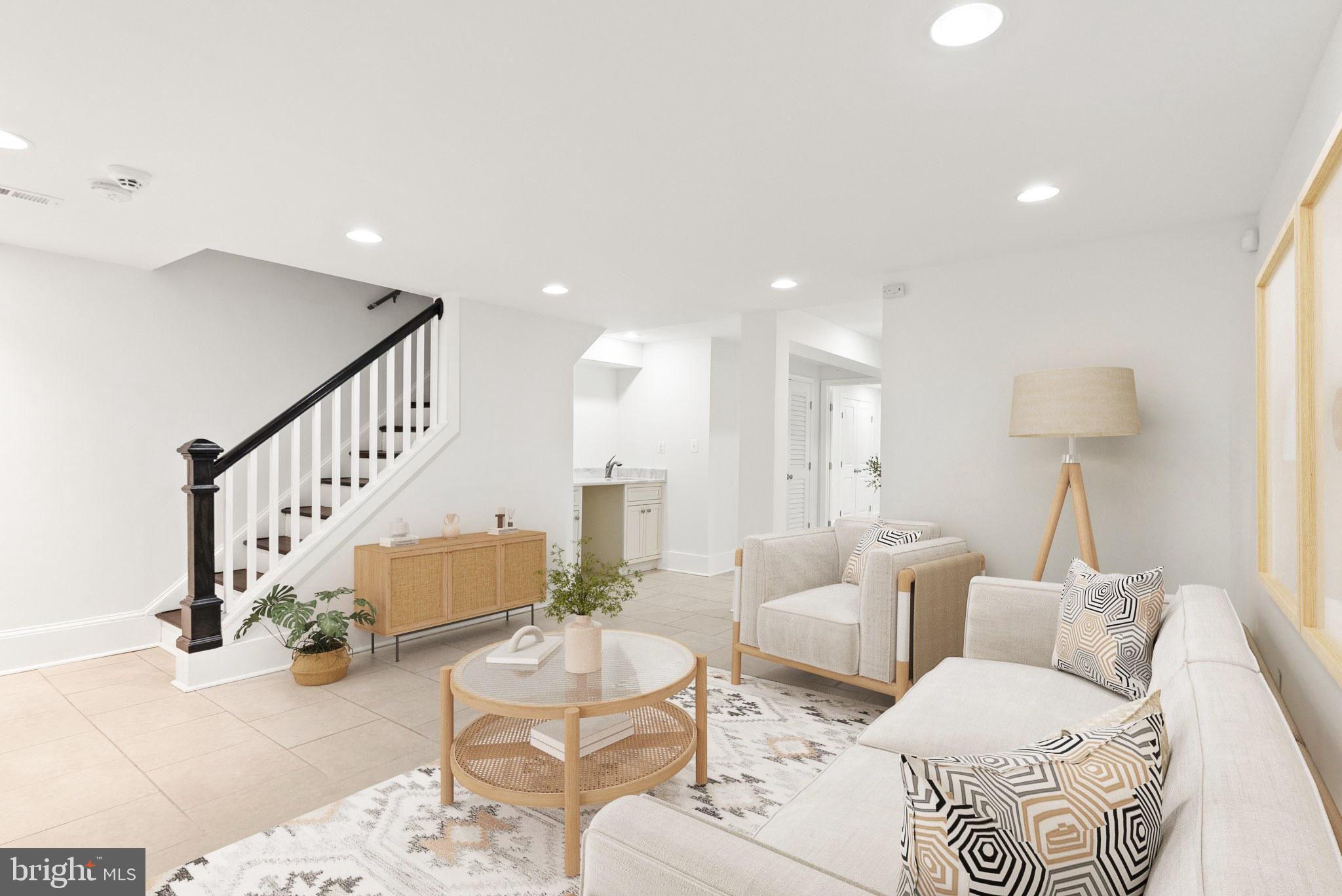 113 Hamilton Street Northwest Washington, DC 20011 - Photo 19 of 24 a living room with furniture and a chandelier
