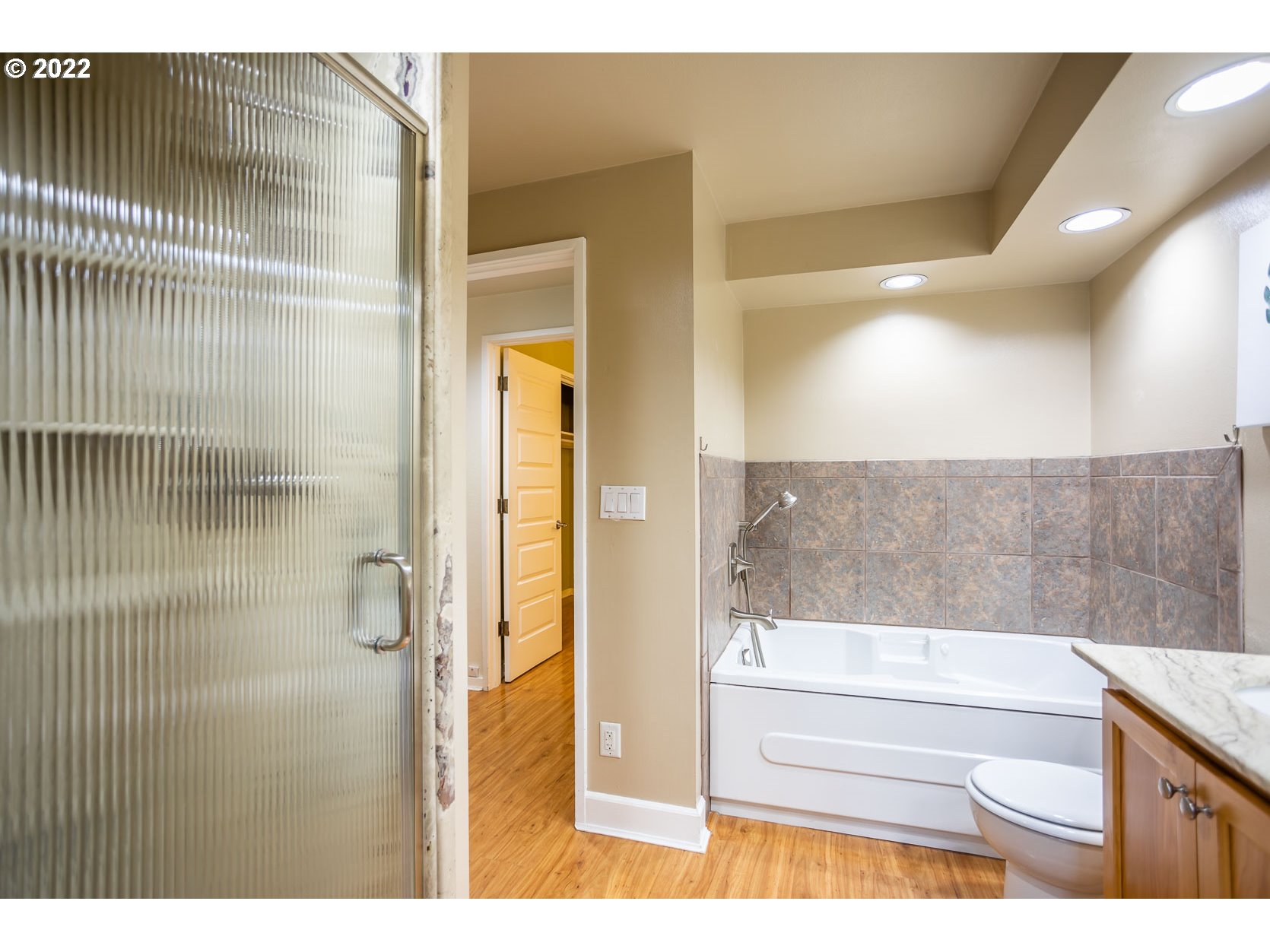 2017 Kimberly Drive Eugene, OR 97405 - Photo 13 of 32 a bathroom with a bathtub and a shower