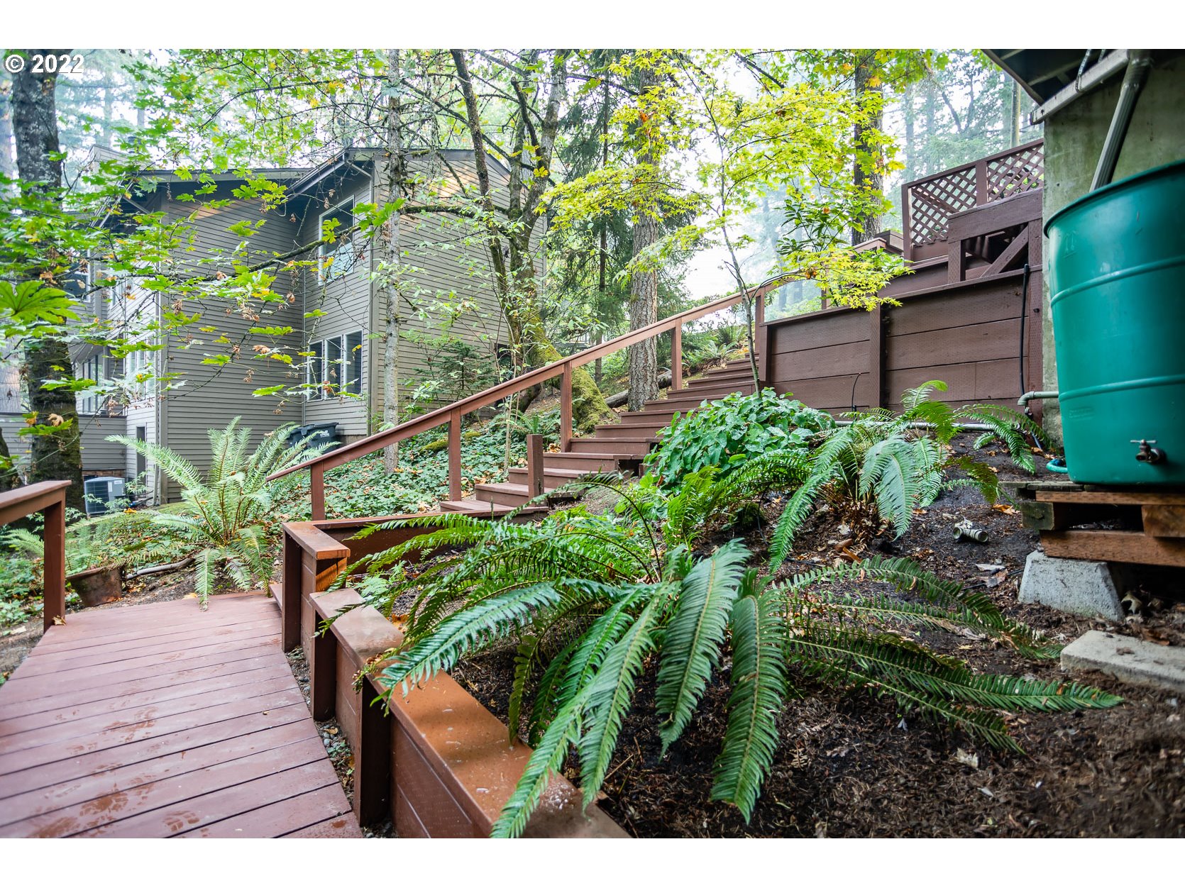 2017 Kimberly Drive Eugene, OR 97405 - Photo 25 of 32 a balcony with lots of green trees in front of it