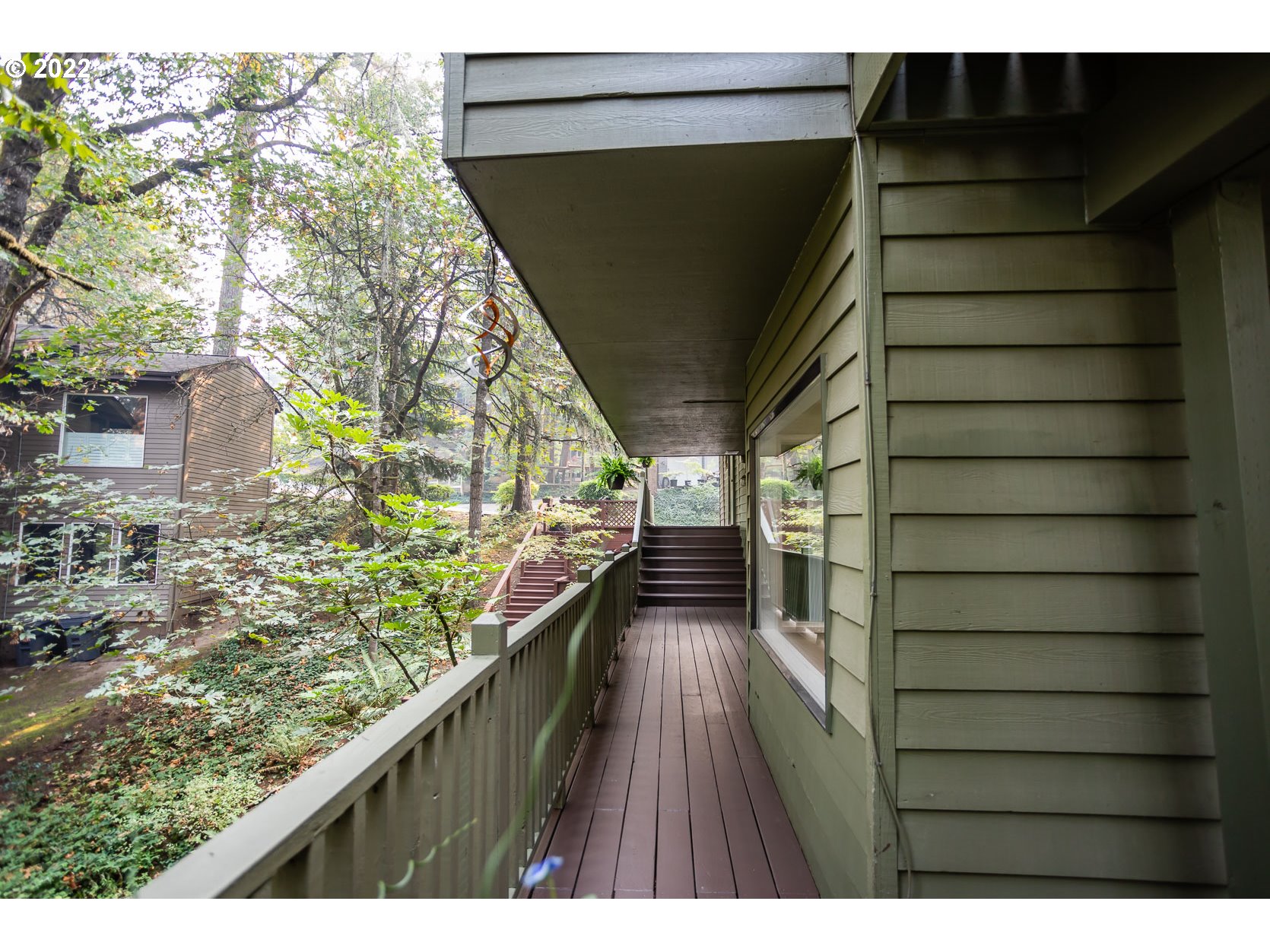 2017 Kimberly Drive Eugene, OR 97405 - Photo 30 of 32 a balcony with wooden floor and an outdoor view