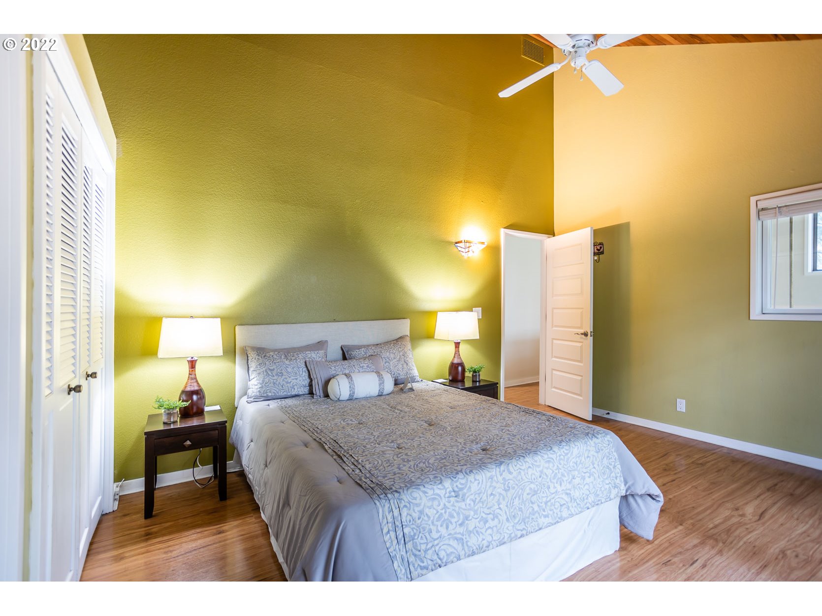 2017 Kimberly Drive Eugene, OR 97405 - Photo 10 of 32 a bedroom with a bed and wooden floor