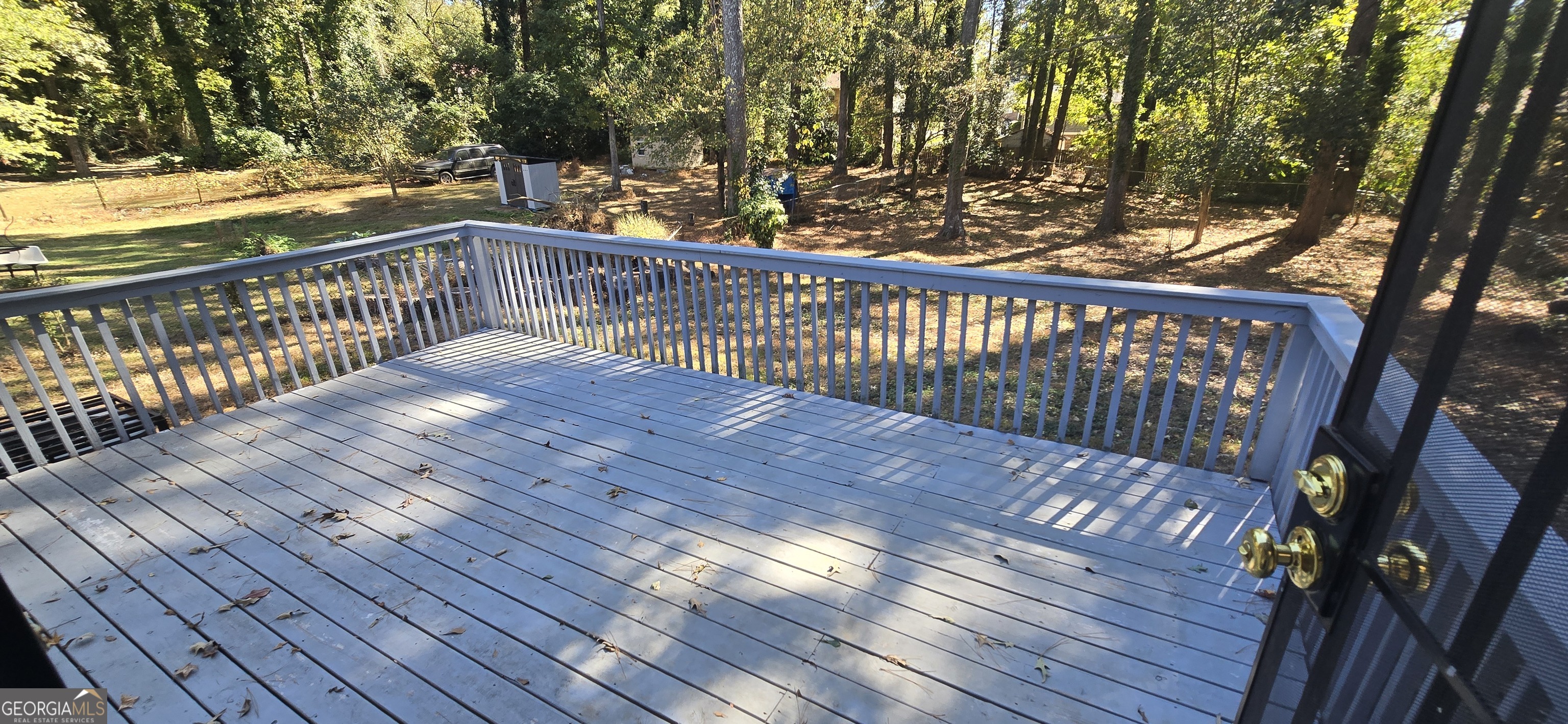 4085 Canby Lane Decatur, GA 30035 - Photo 11 of 12 a view of balcony with wooden floor