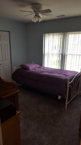 459 Herman Street Crete, IL 60417 - Photo 14 of 20 a room with a bed and window