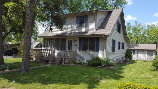 459 Herman Street Crete, IL 60417 - Photo 2 of 20 a front view of house with yard and green space