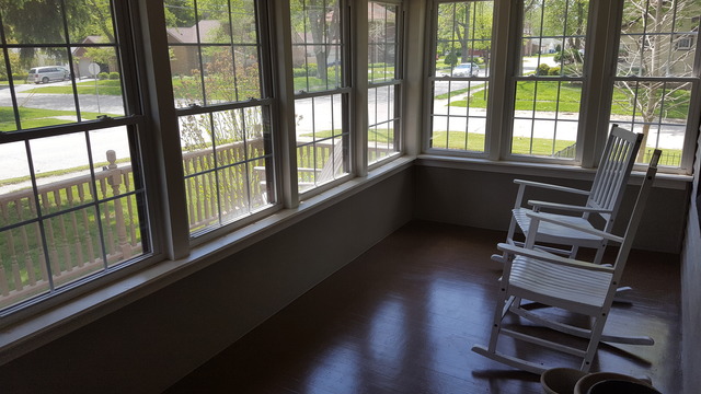 459 Herman Street Crete, IL 60417 - Photo 4 of 20 a view of a room with wooden floor and windows