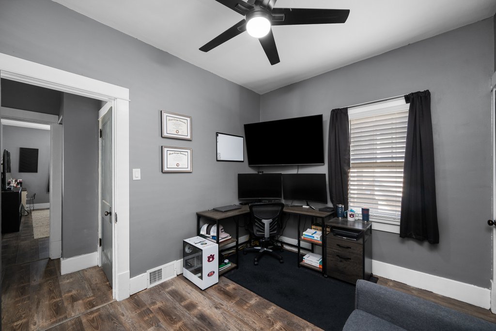 716 Morton Avenue Kewanee, IL 61443 - Photo 13 of 26 a view of a livingroom with workspace and a window