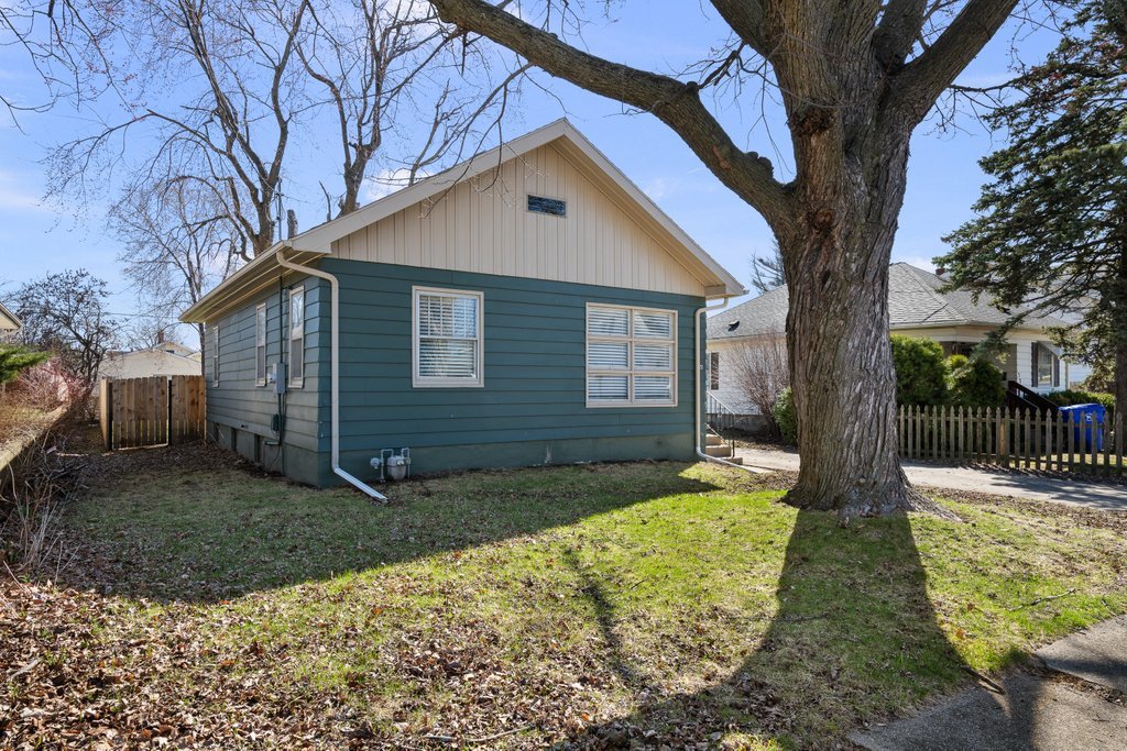 716 Morton Avenue Kewanee, IL 61443 - Photo 2 of 26 a front view of a house with garden