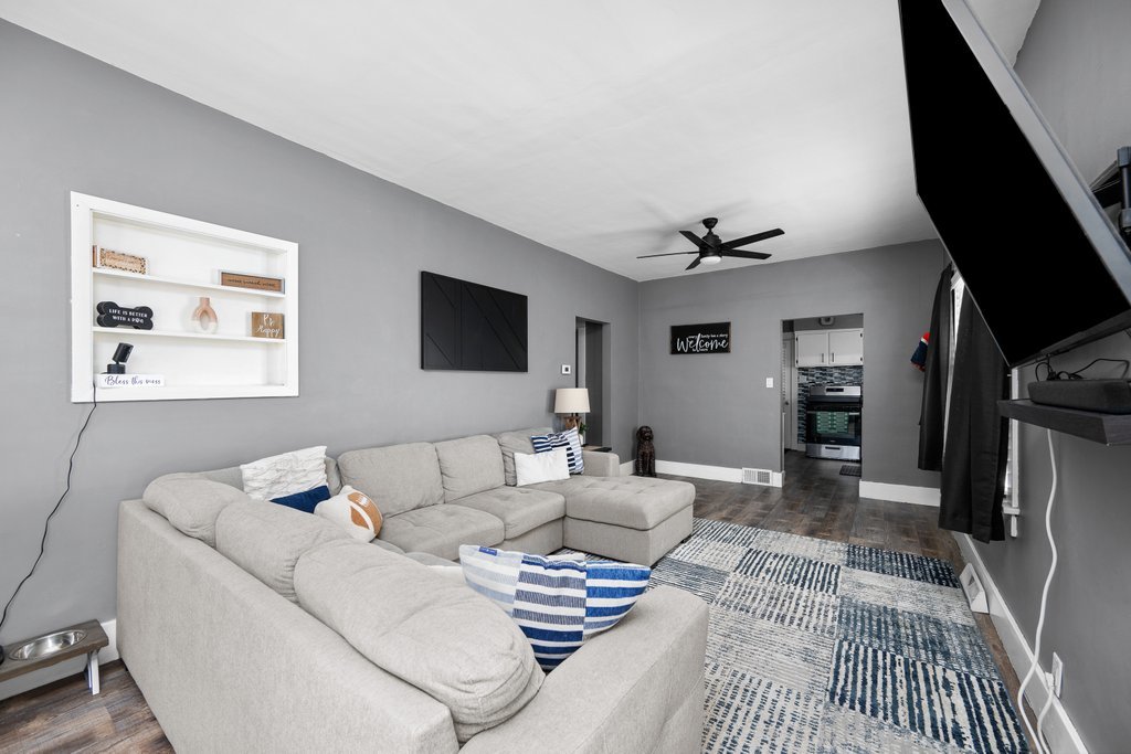 716 Morton Avenue Kewanee, IL 61443 - Photo 6 of 26 a living room with furniture and a flat screen tv