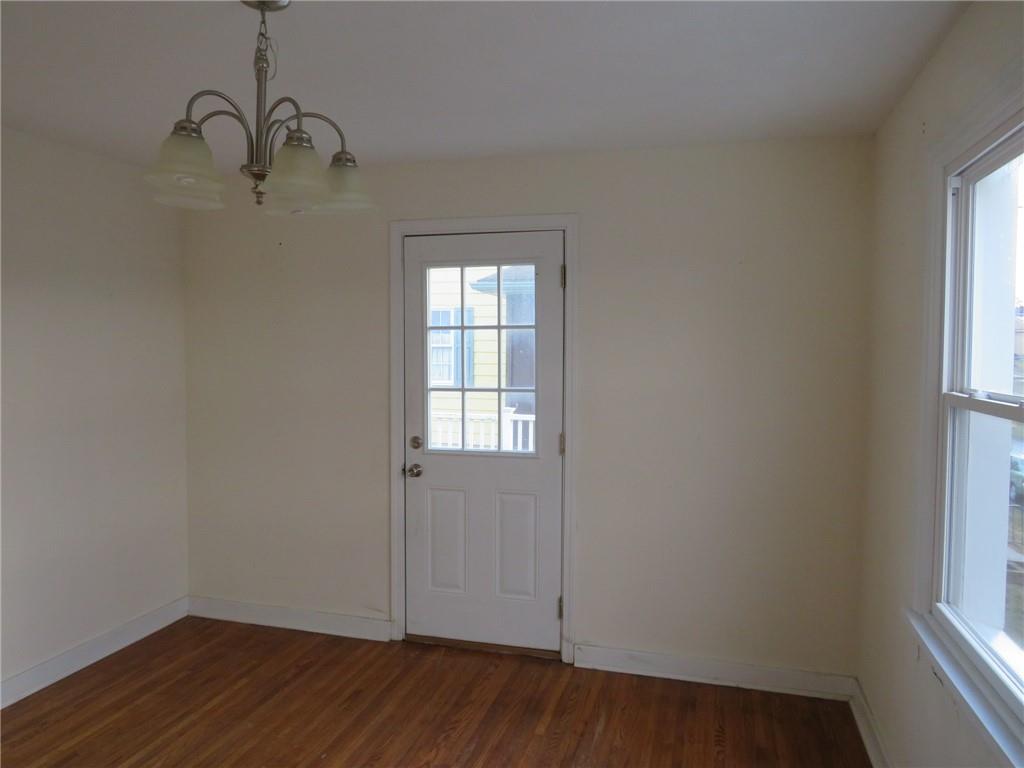 347 Clark Street Washington, PA 15301 - Photo 11 of 33 an empty room with wooden floor and windows