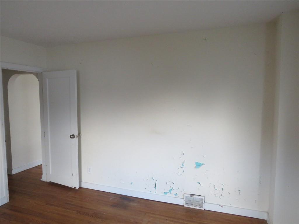 347 Clark Street Washington, PA 15301 - Photo 18 of 33 an empty room with wooden floor
