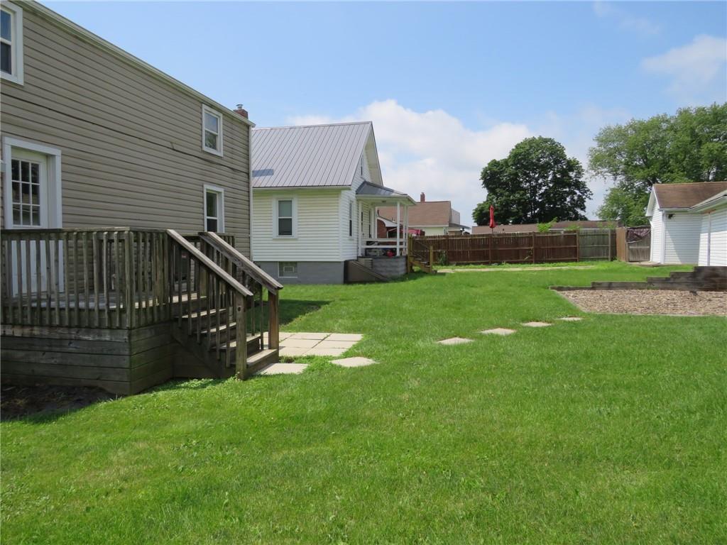 347 Clark Street Washington, PA 15301 - Photo 32 of 33 a view of a house with a yard and a large tree