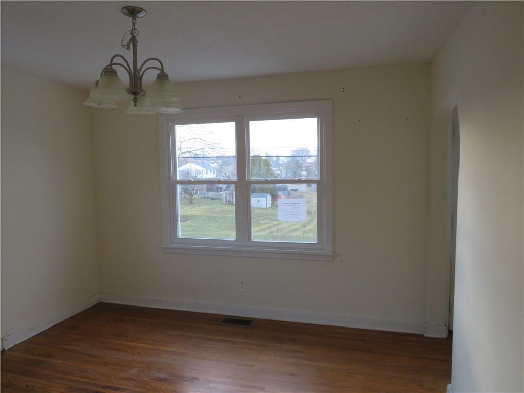 347 Clark Street Washington, PA 15301 - Photo 10 of 33 an empty room with wooden floor and windows