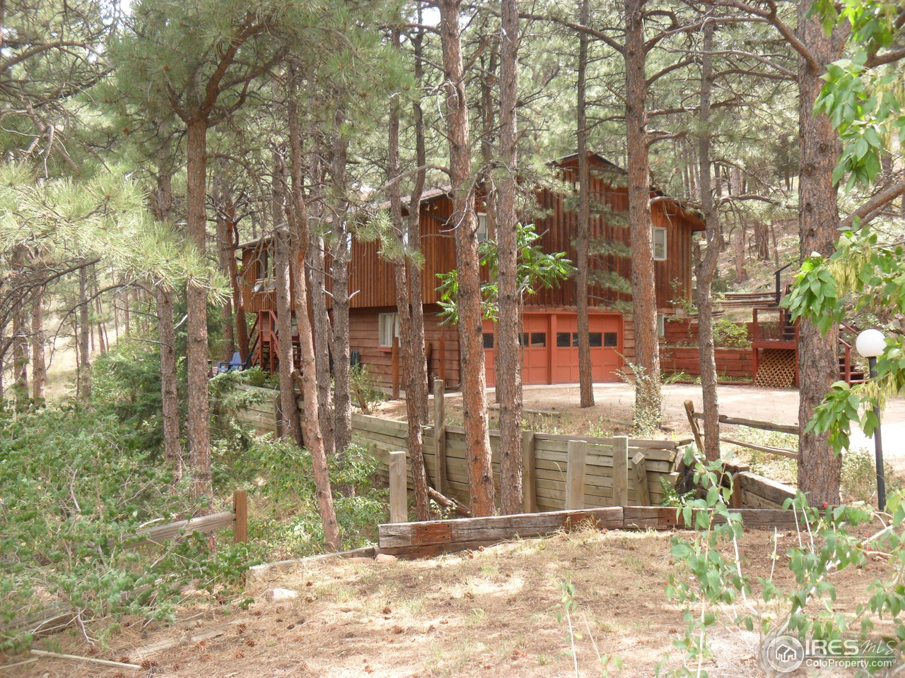 6518 Olde Stage Road Boulder, CO 80302 - Photo 1 of 23 a view of a entrance gate of a house