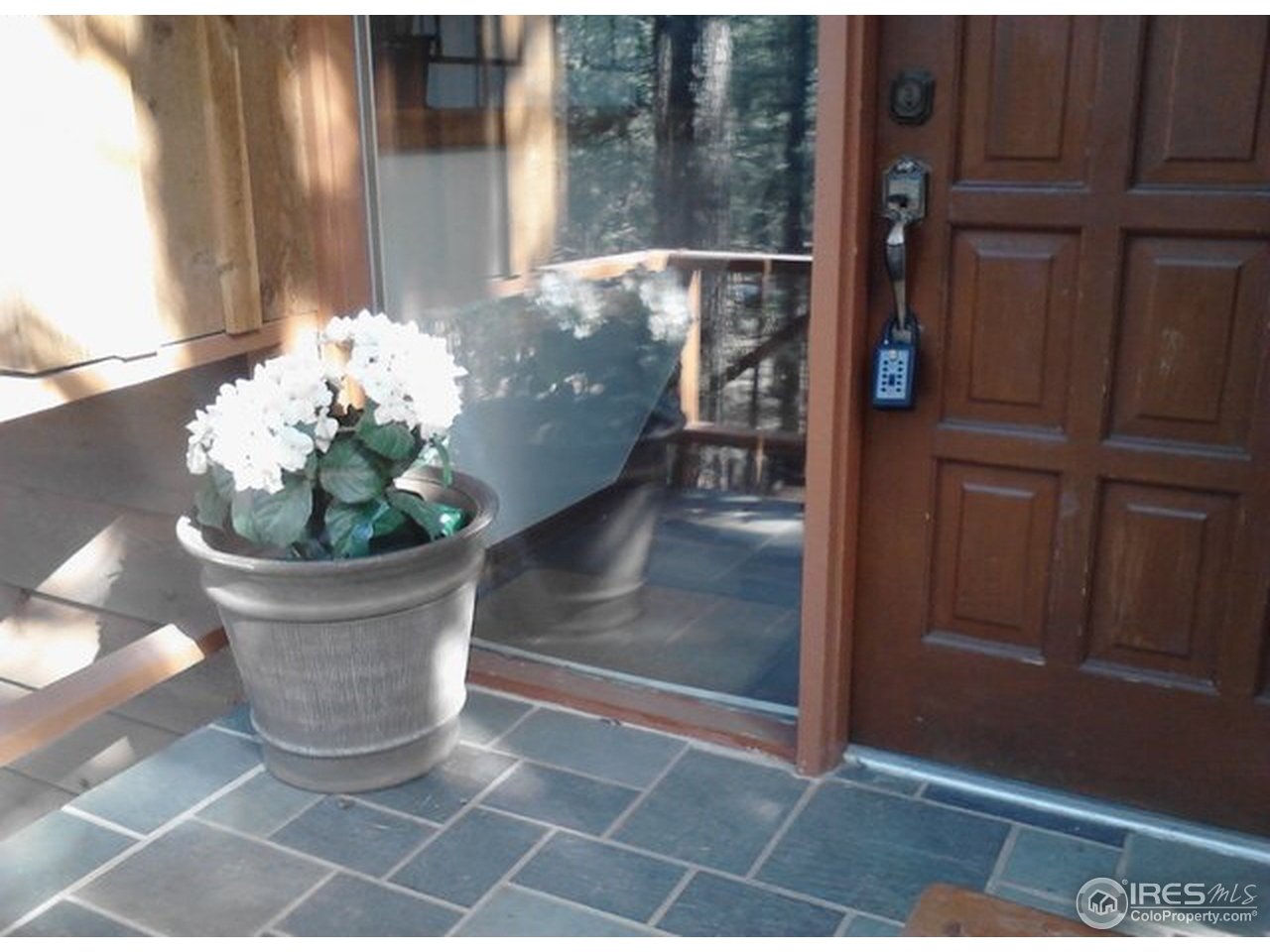 6518 Olde Stage Road Boulder, CO 80302 - Photo 3 of 23 a view of a glass door