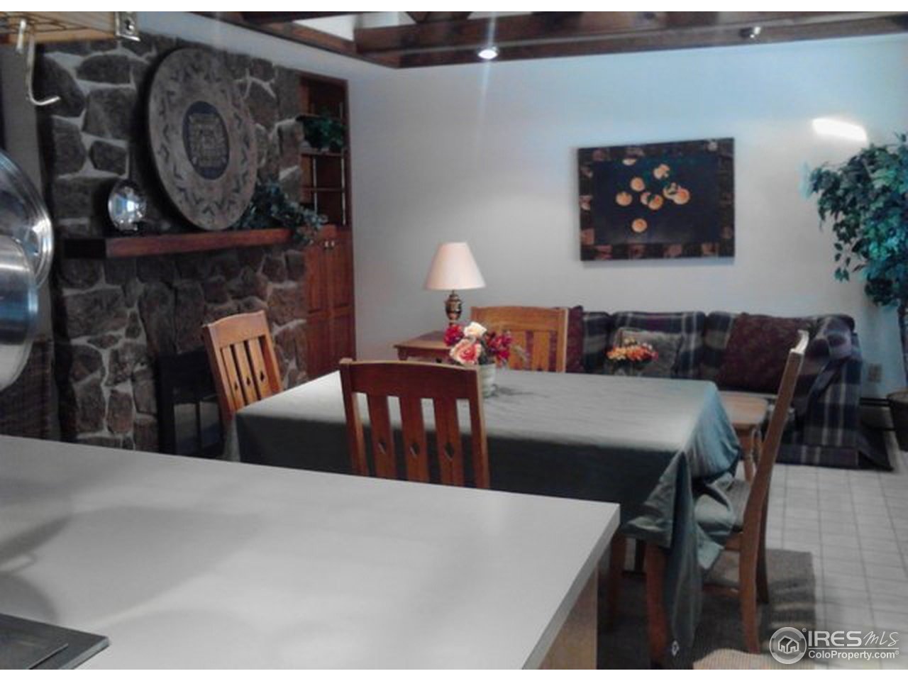 6518 Olde Stage Road Boulder, CO 80302 - Photo 6 of 23 a dining room with furniture and wooden floor